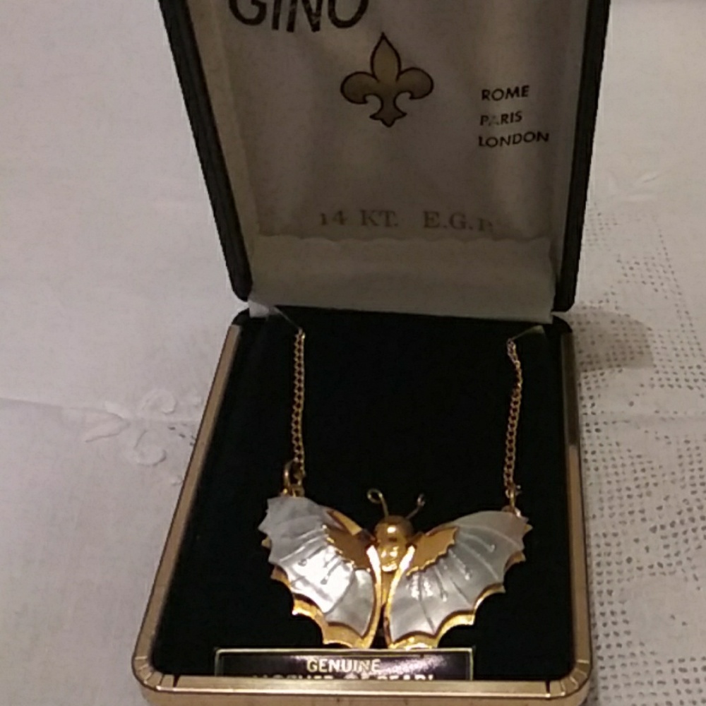 Beautiful mother of pearl butterfly necklace.